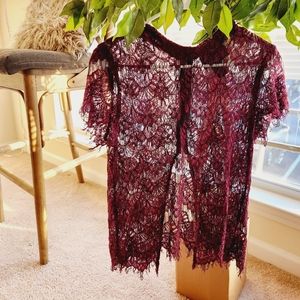 Cute dark burgundy LACE/NET shirt with a SMALL but POWERFUL, PEEK-A-BOO  cut out